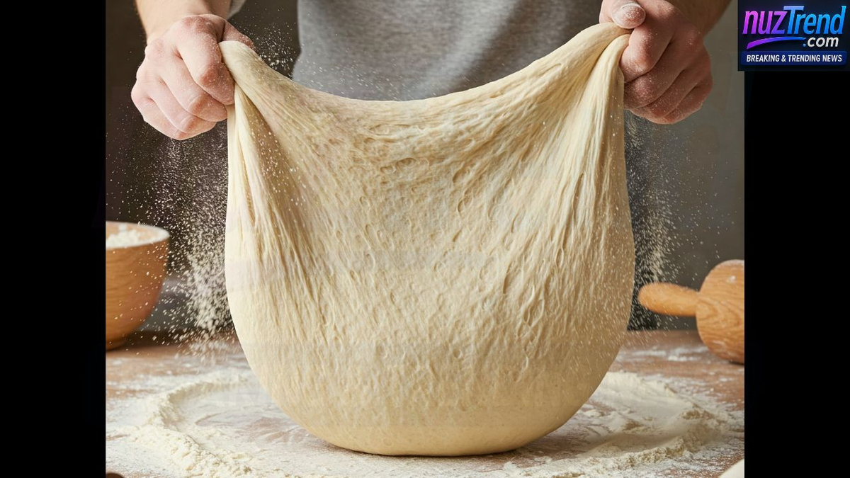 Kneading dough on a floured surface