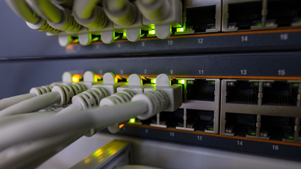 LAN gaming setup with two consoles or PCs connected via Ethernet switch