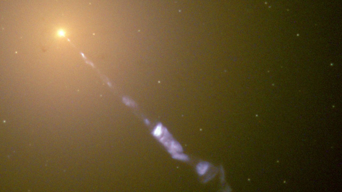 Mass near the M87* black hole is converted into a powerful astrophysical jet stretching 5000 light years