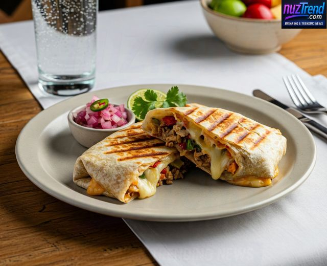 Healthy grilled cheese burrito served on a plate with avocado and dip