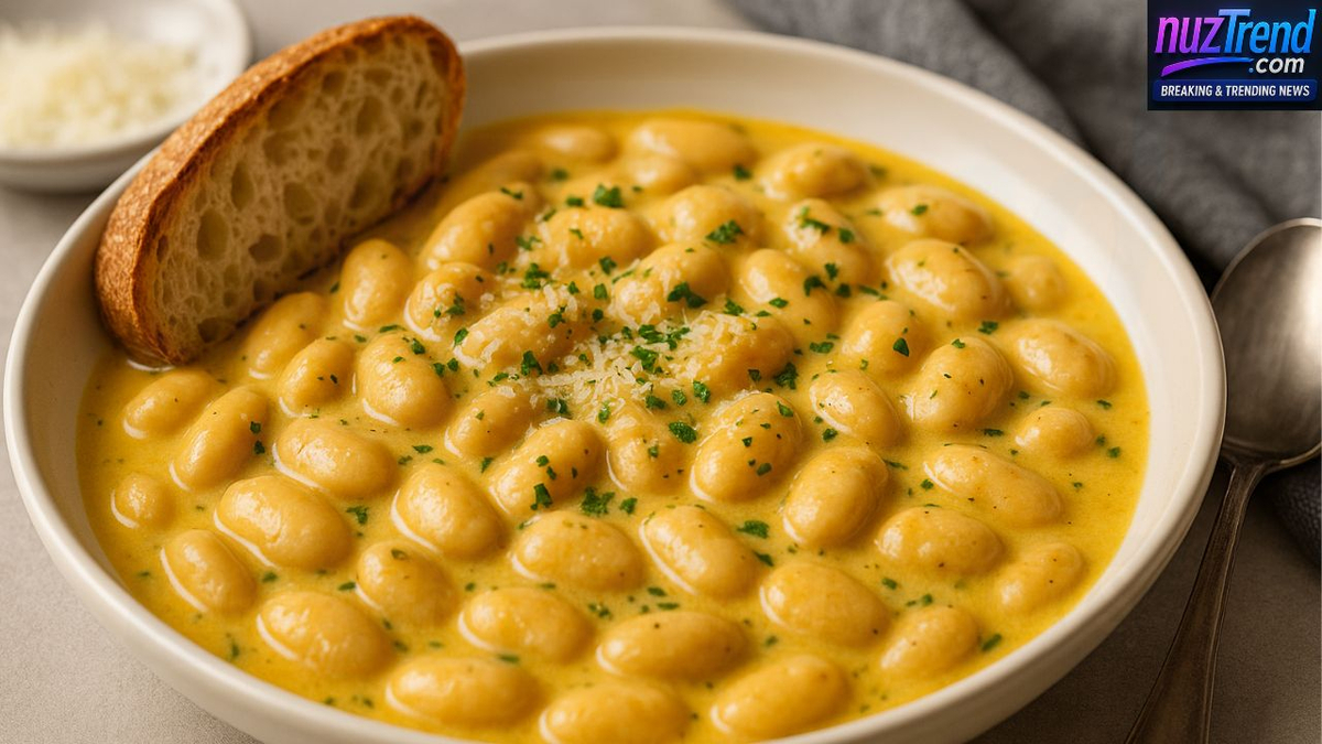 Seasoning butter beans with lemon juice and herbs