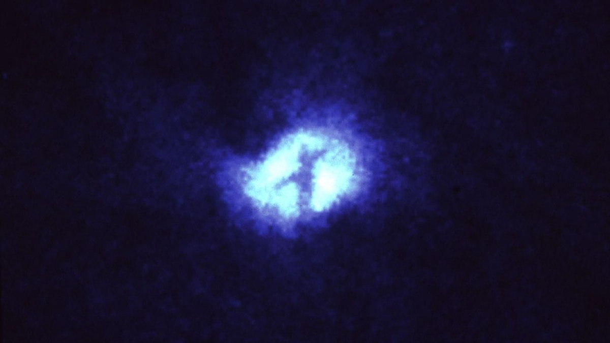 Whirlpool Galaxy M51's active galactic nucleus, occluded by some dust