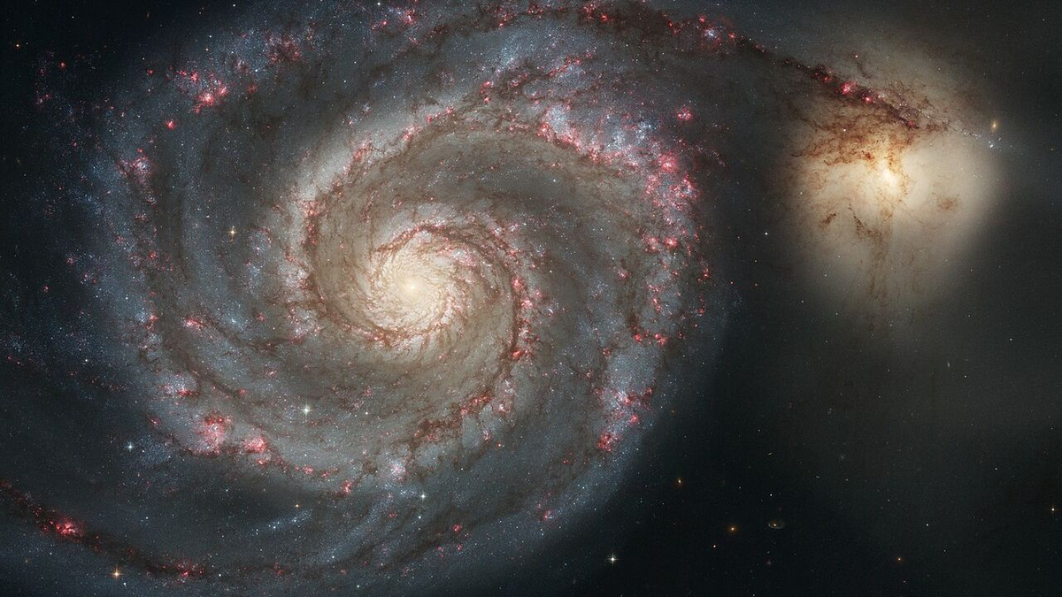 The Whirlpool Galaxy (Spiral Galaxy M51, NGC 5194), a classic spiral galaxy located in the Canes Venatici constellation, and its companion NGC 5195.